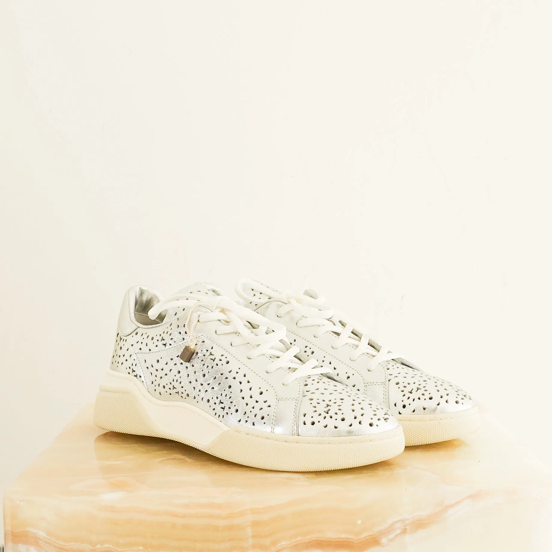 Silver trainers RRP £500