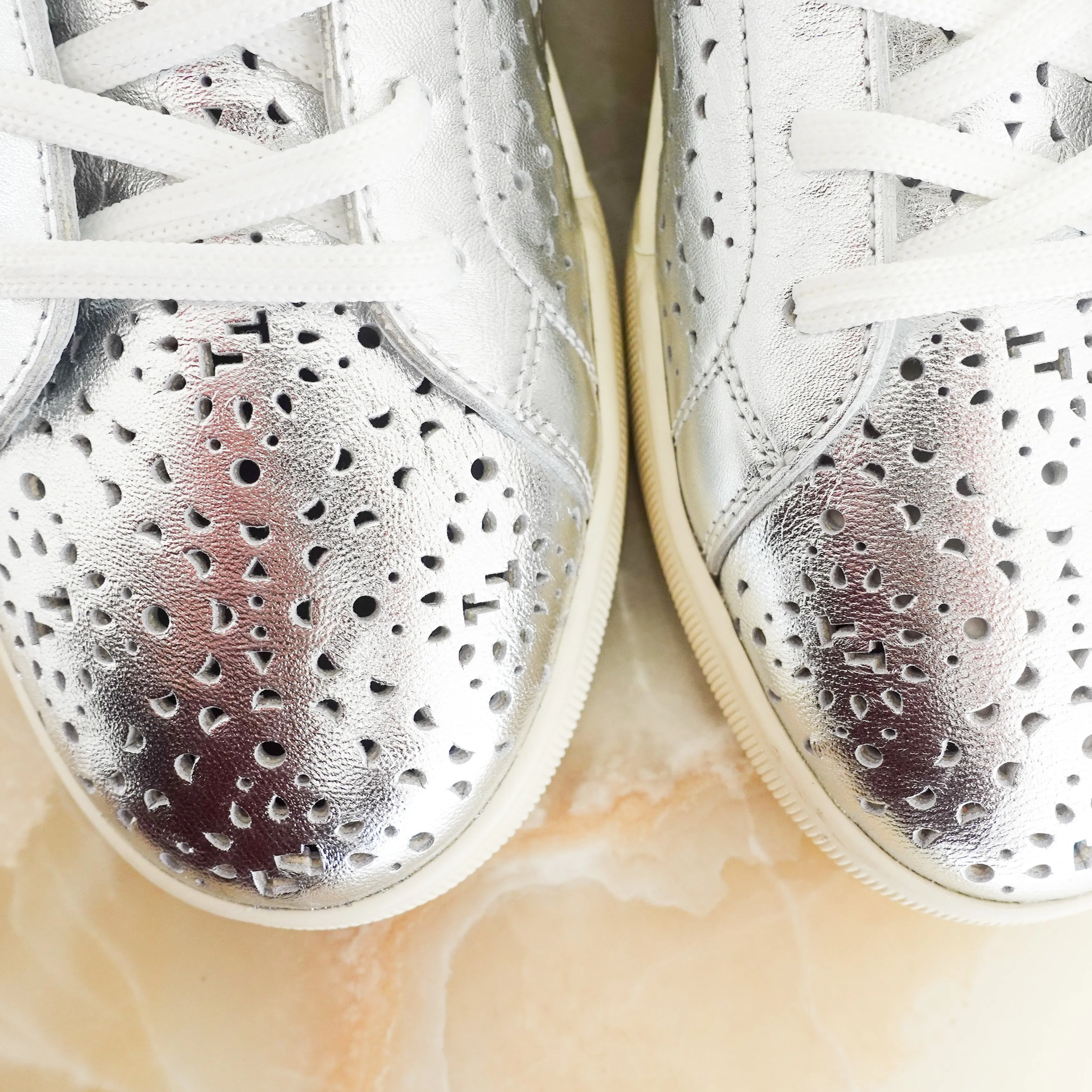 Silver trainers RRP £500